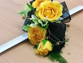 Yellow rose wrist corsage